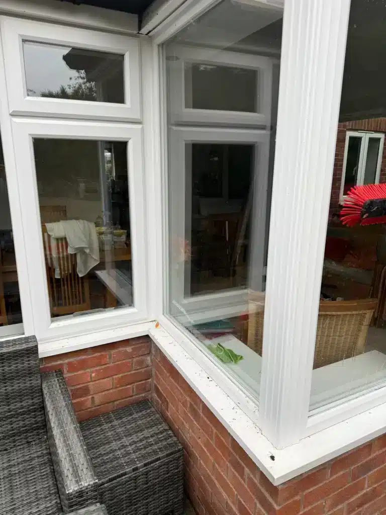 Exterior windows and white frames at a Longford property before an end-of-tenancy handover