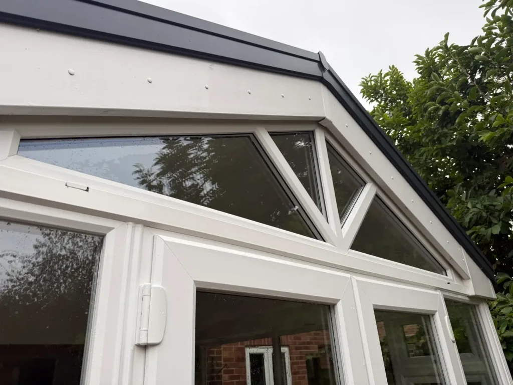 Clean upper window panes and white frames after end-of-tenancy window cleaning in Longford