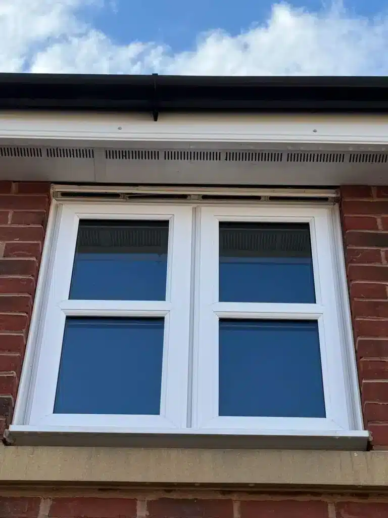 White window frame, fascia and soffit following cleaning in Uckington, Cheltenham