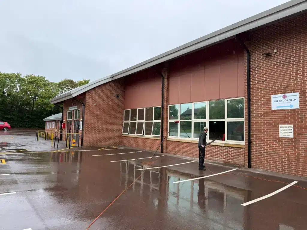 Crystal Clear Gloucestershire cleaning exterior windows at Churchdown Community Centre in Churchdown, Gloucester